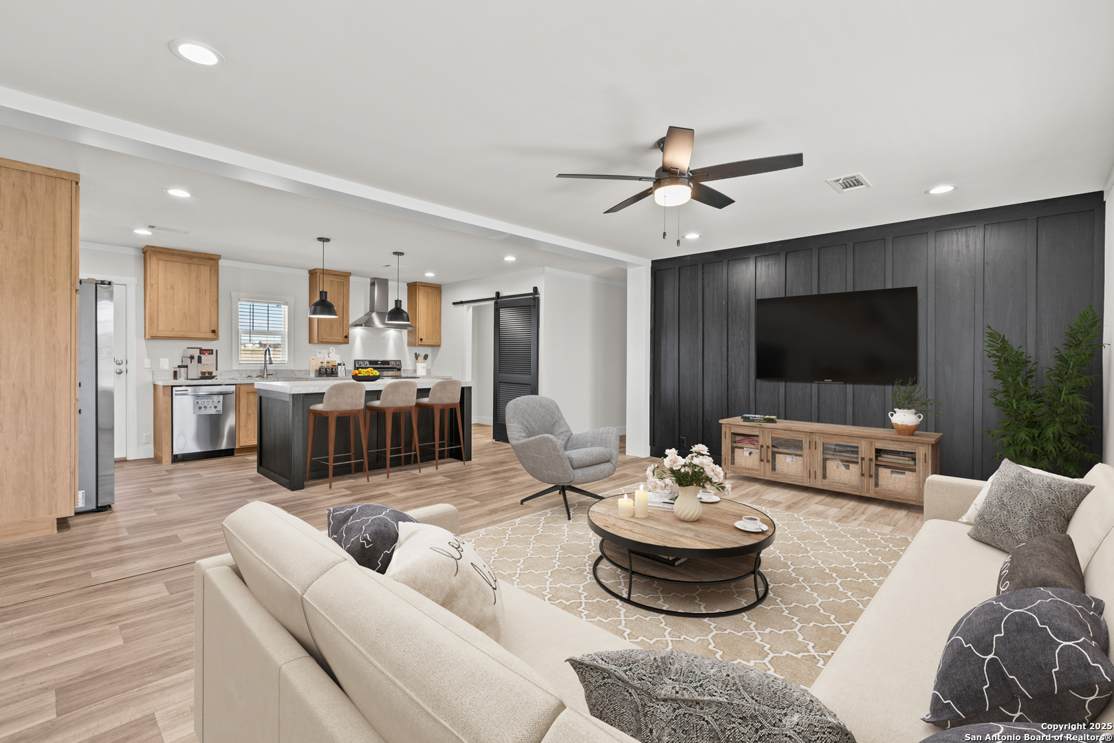 2354 Stevens Road Somerset, TX 78069 - Photo 5 of 22 a living room with furniture and a flat screen tv
