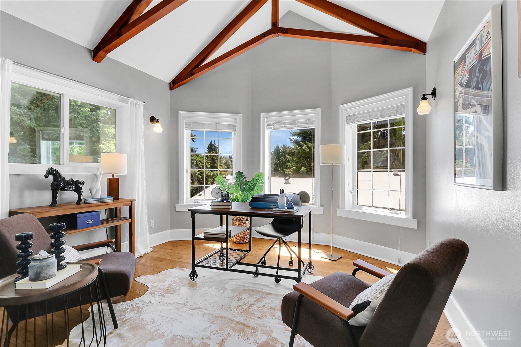 9510 9th Avenue Northwest Seattle, WA 98117 - Photo 14 of 31 a living room with furniture a fireplace and large windows