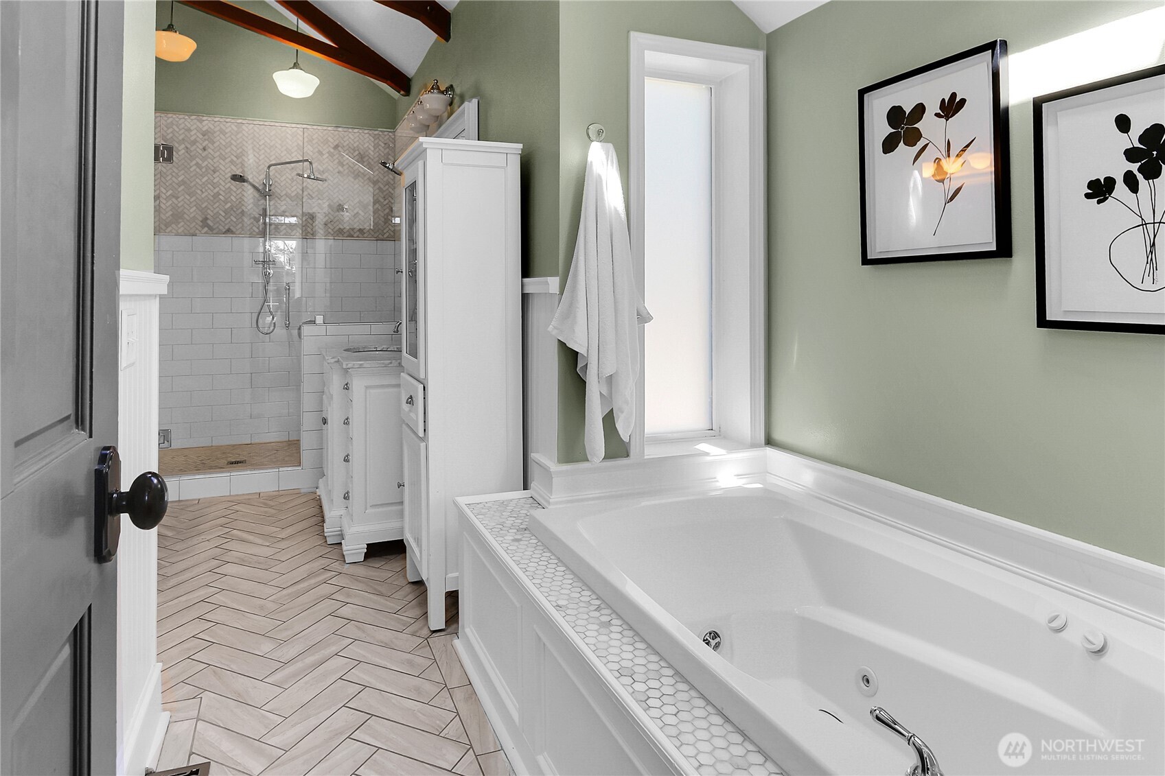 9510 9th Avenue Northwest Seattle, WA 98117 - Photo 17 of 31 a bathroom with a tub and a shower