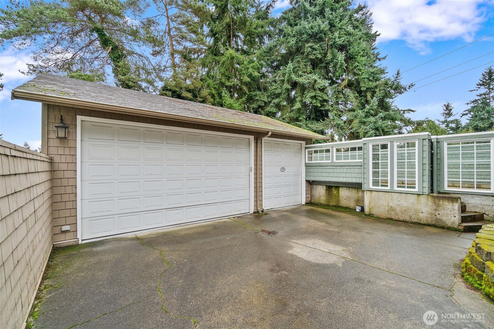 9510 9th Avenue Northwest Seattle, WA 98117 - Photo 29 of 31 a view of a house with a garage