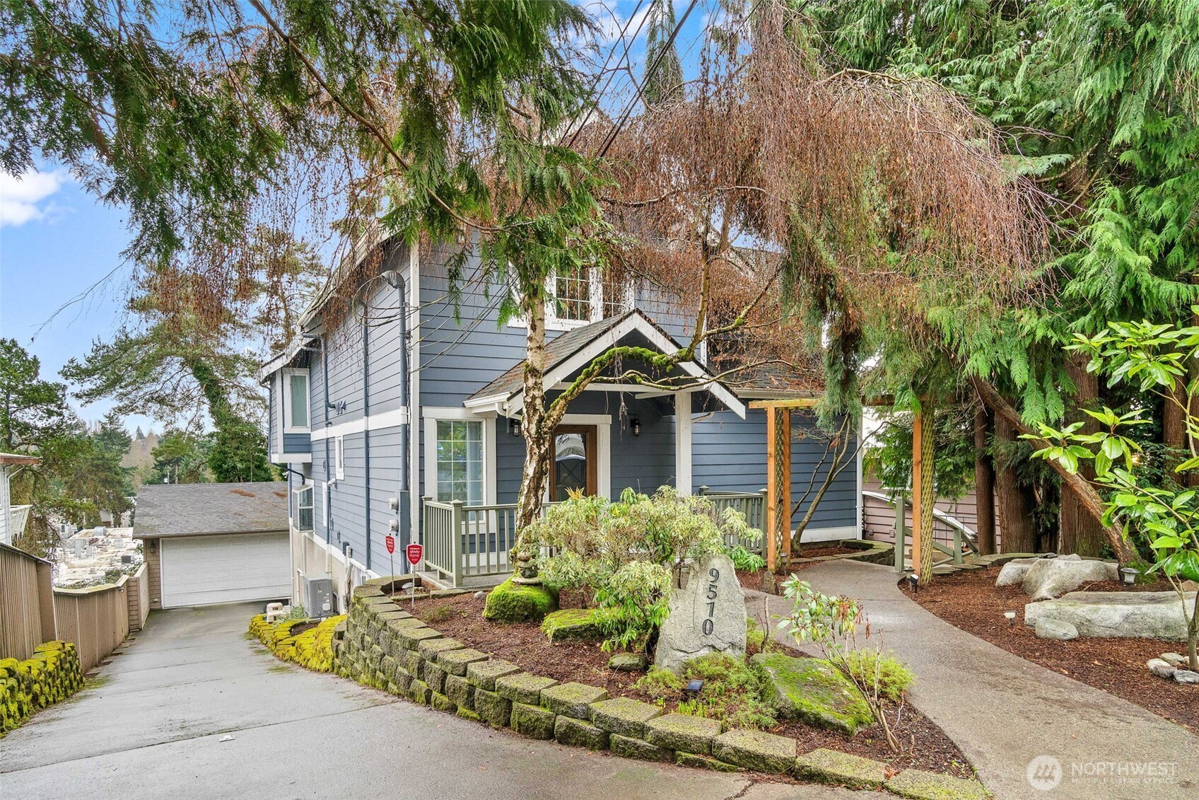 9510 9th Avenue Northwest Seattle, WA 98117 - Photo 31 of 31 a front view of a house with garden