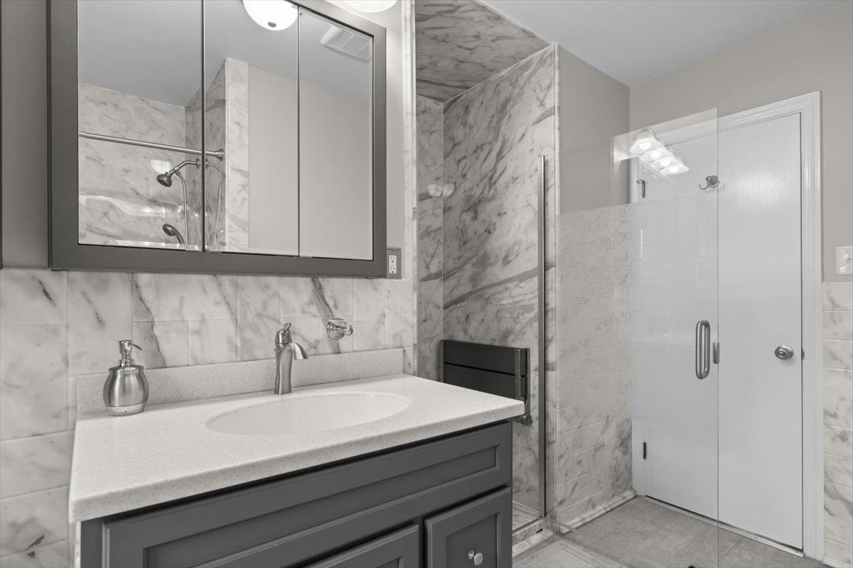 13 Springcrest Drive Luray, VA 22835 - Photo 17 of 41 a bathroom with a sink and mirror