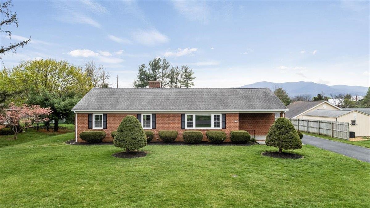 13 Springcrest Drive Luray, VA 22835 - Photo 23 of 41 a front view of house with a garden and pathway