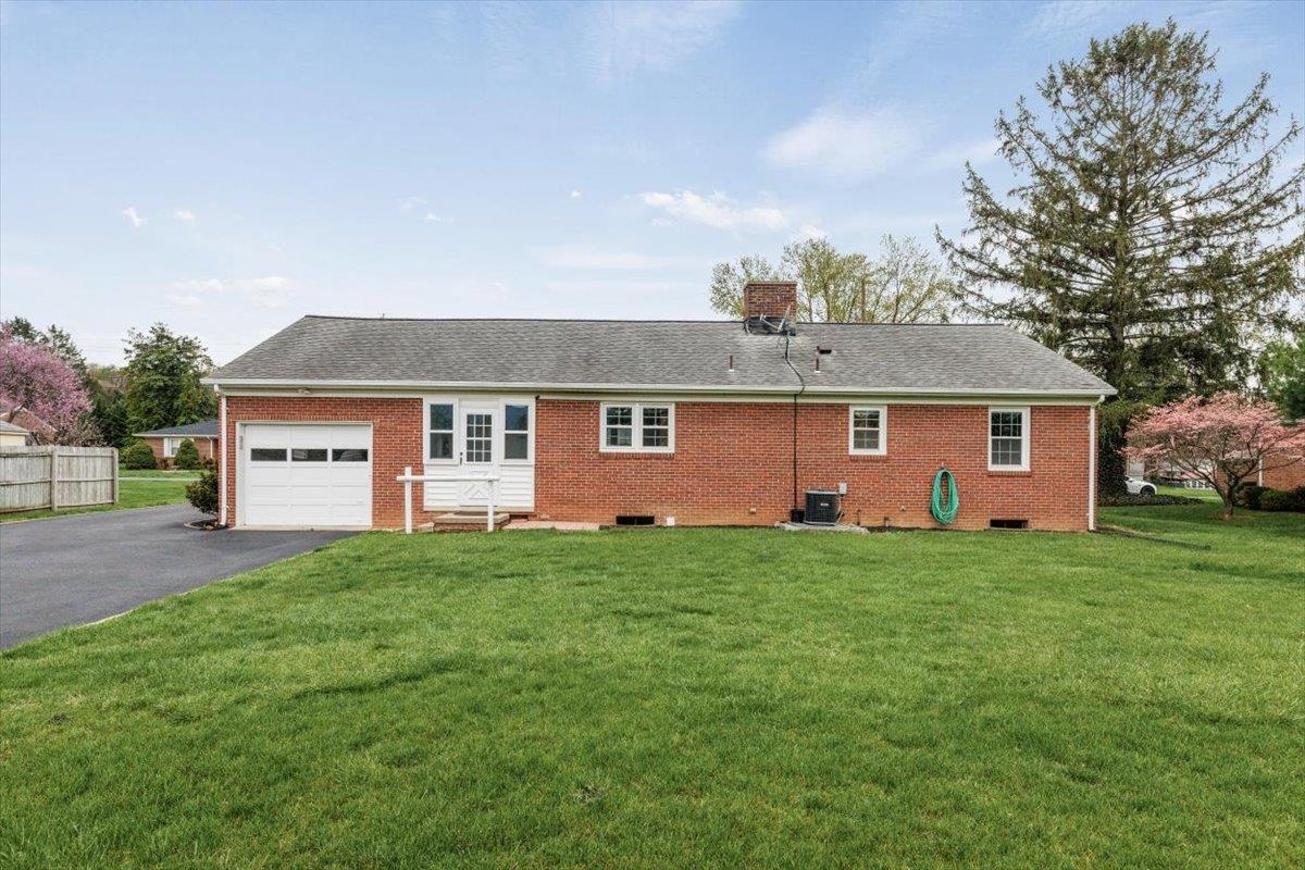 13 Springcrest Drive Luray, VA 22835 - Photo 3 of 41 a view of a yard in front of a house with large trees