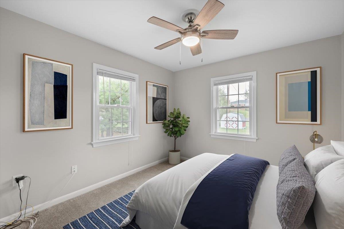 13 Springcrest Drive Luray, VA 22835 - Photo 36 of 41 a bedroom with a large bed and a window