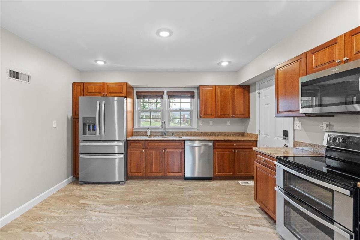 13 Springcrest Drive Luray, VA 22835 - Photo 10 of 41 a kitchen with stainless steel appliances granite countertop a refrigerator stove and oven