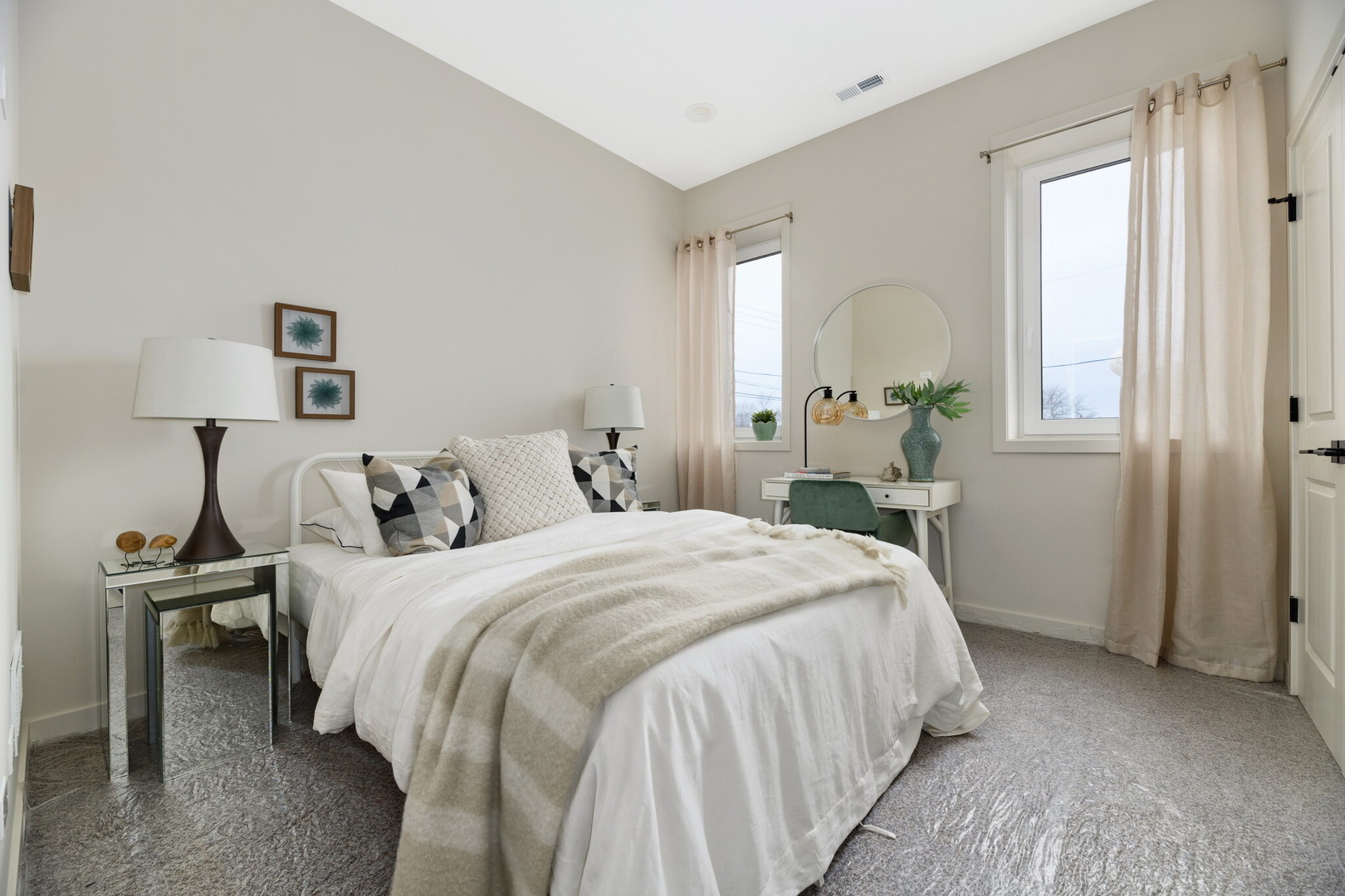 740 East Irving Park Road, Unit 3W Roselle, IL 60172 - Photo 8 of 15 a bedroom with a bed and a lamp
