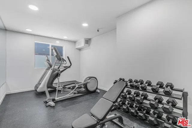 a view of a water heater room with a garage