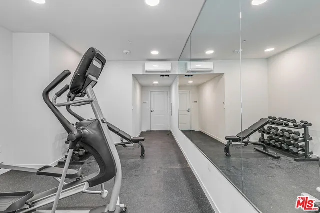 a sign that is on a white wall