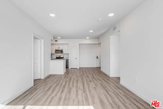 a view of kitchen with wooden floor