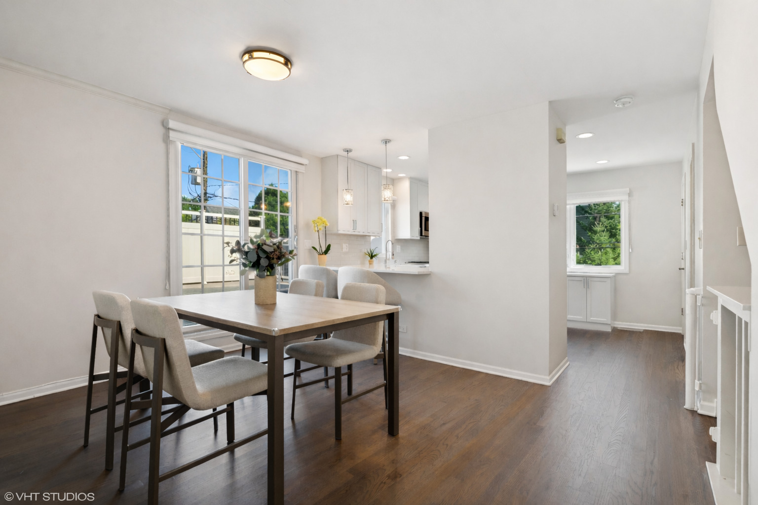 1251 West Fletcher Street, Unit E Chicago, IL 60657 - Photo 4 of 20 a view of a dining room with furniture and wooden floor