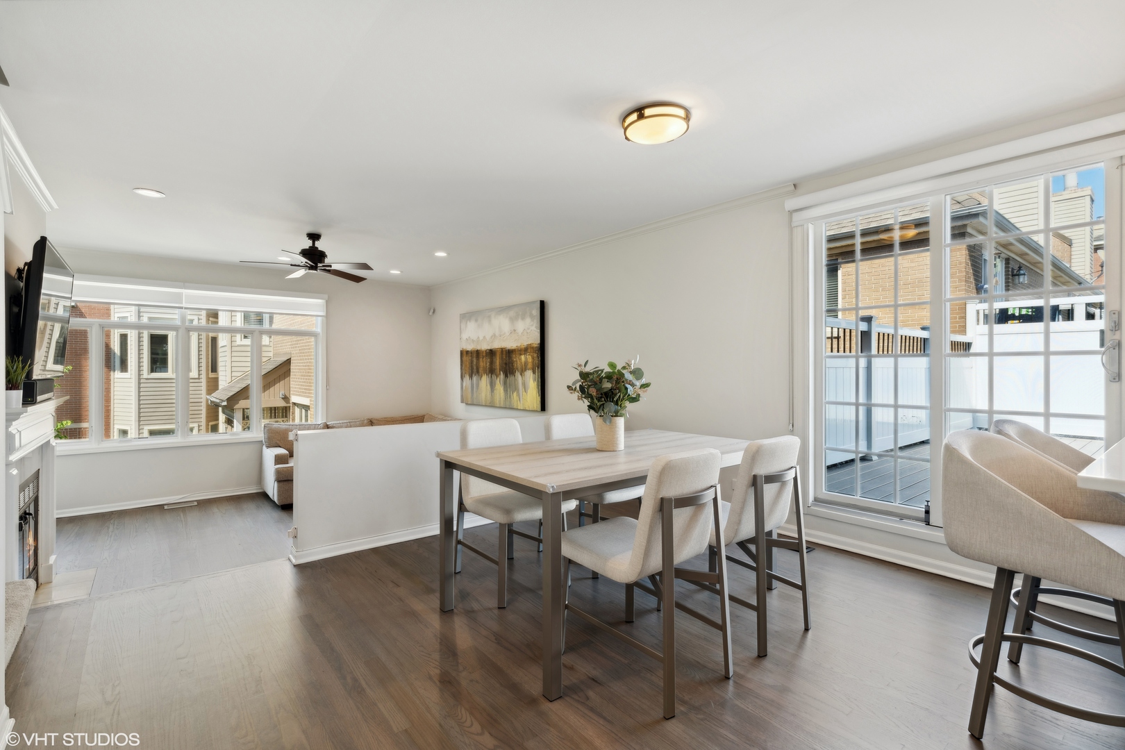 1251 West Fletcher Street, Unit E Chicago, IL 60657 - Photo 5 of 20 a view of a dining room with furniture and wooden floor