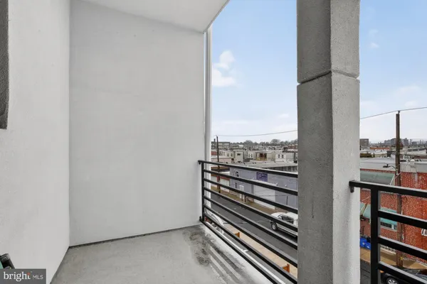 a view of a balcony with an outdoor space
