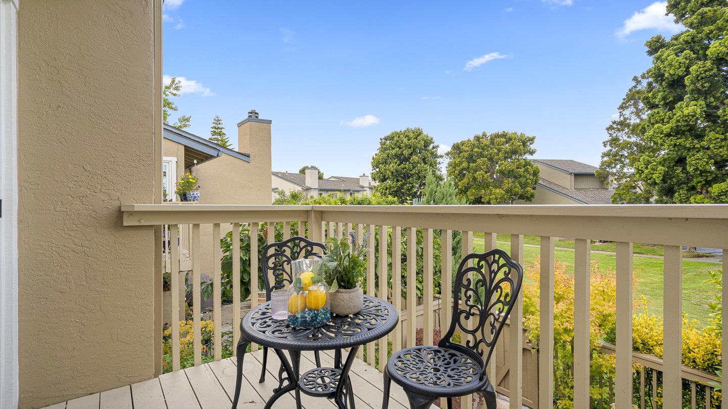 706 Celestial Lane Foster City, CA 94404 - Photo 20 of 36 a view of a balcony with chairs and potted plants