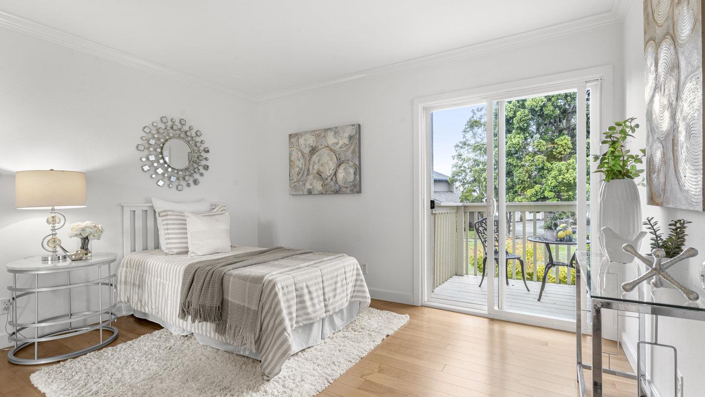 706 Celestial Lane Foster City, CA 94404 - Photo 24 of 36 a bedroom with a bed and a painting on the wall