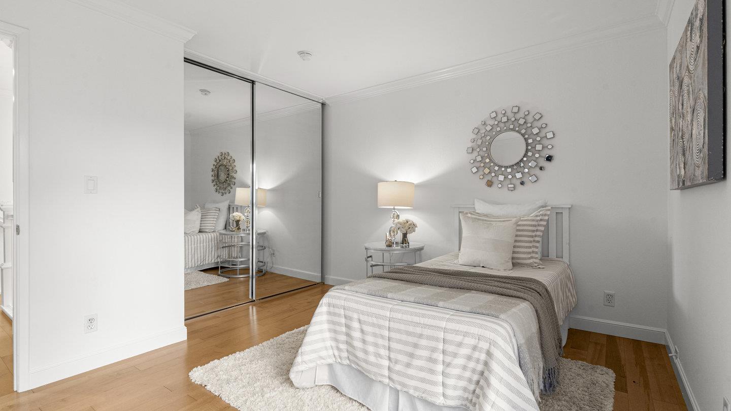 706 Celestial Lane Foster City, CA 94404 - Photo 25 of 36 a bedroom with a bed and a table in it