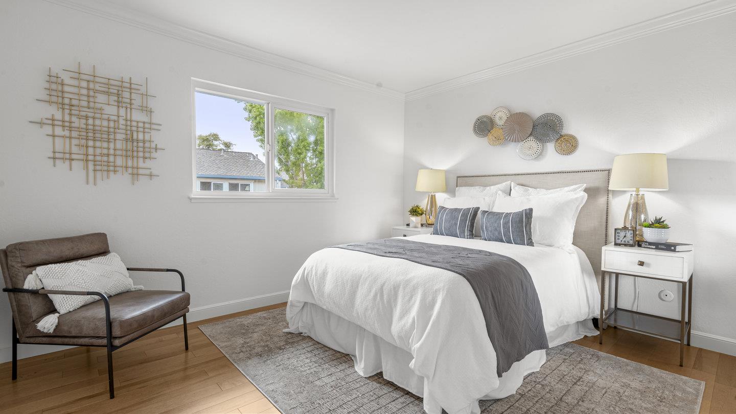 706 Celestial Lane Foster City, CA 94404 - Photo 28 of 36 a bedroom with a bed and chair