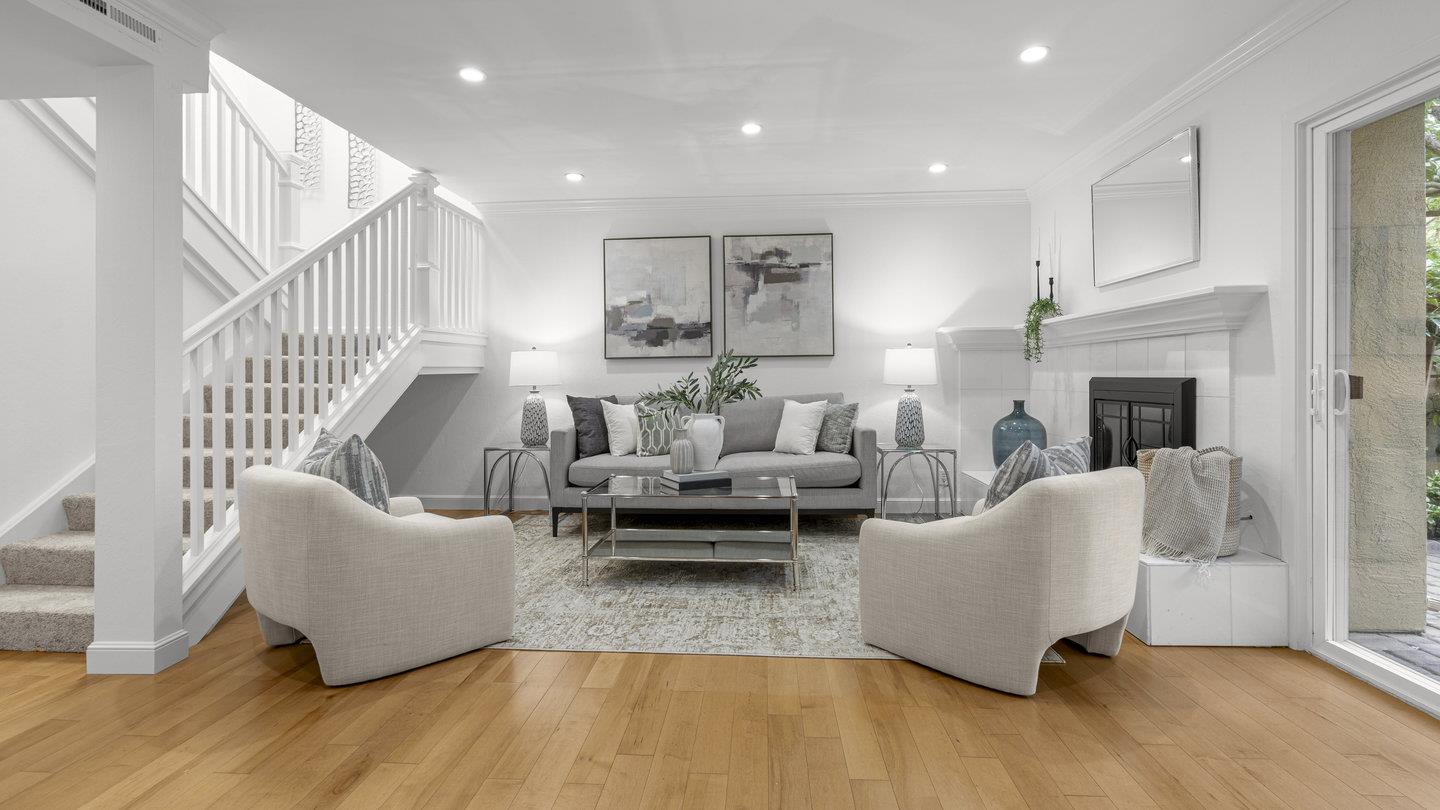 706 Celestial Lane Foster City, CA 94404 - Photo 3 of 36 a living room with furniture and a fireplace