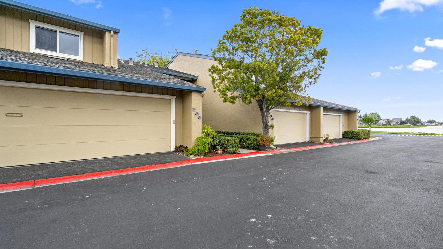 706 Celestial Lane Foster City, CA 94404 - Photo 31 of 36 a house that has a tree in front of it