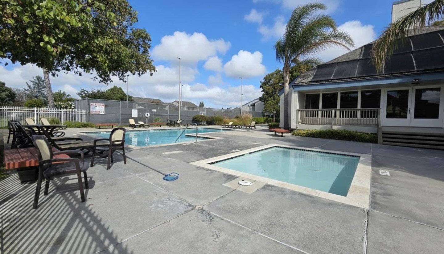 706 Celestial Lane Foster City, CA 94404 - Photo 36 of 36 a view of a swimming pool with outdoor seating