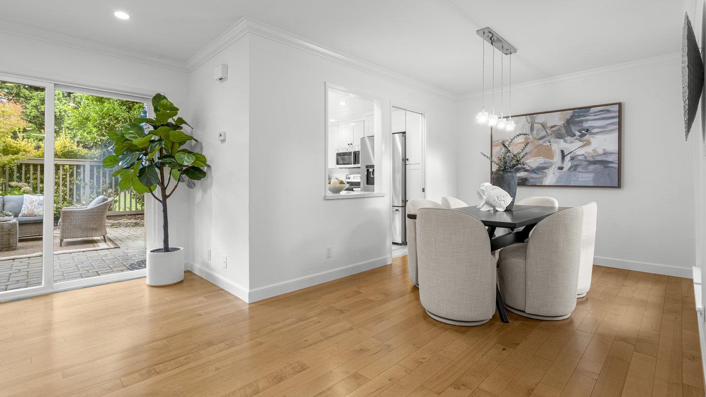 706 Celestial Lane Foster City, CA 94404 - Photo 4 of 36 a view of a room with wooden floor and a potted plant