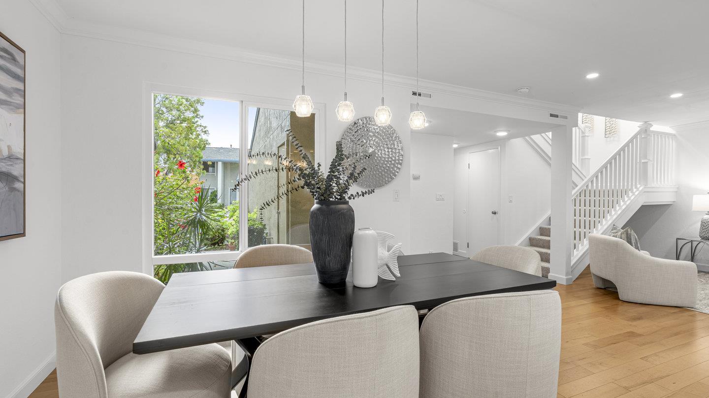 706 Celestial Lane Foster City, CA 94404 - Photo 5 of 36 a view of a dining room with furniture and a potted plant