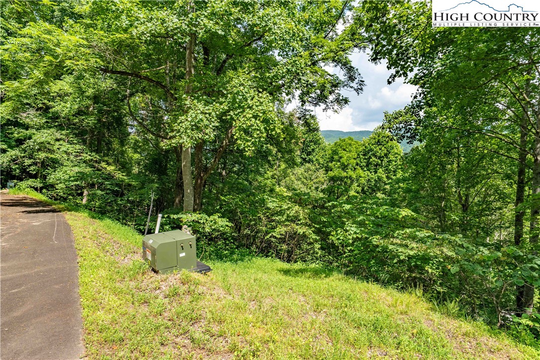 Lot 21 Lake Ridge Road Butler, TN 37640 - Photo 23 of 25 a view of a lake with a house