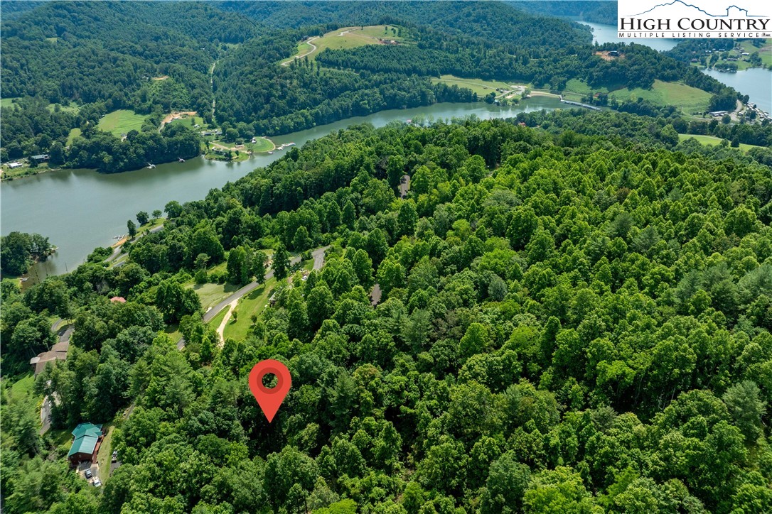 Lot 21 Lake Ridge Road Butler, TN 37640 - Photo 9 of 25 an aerial view of residential house with outdoor space and trees all around