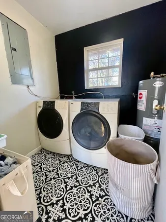 a living room with a couch and a stove top oven