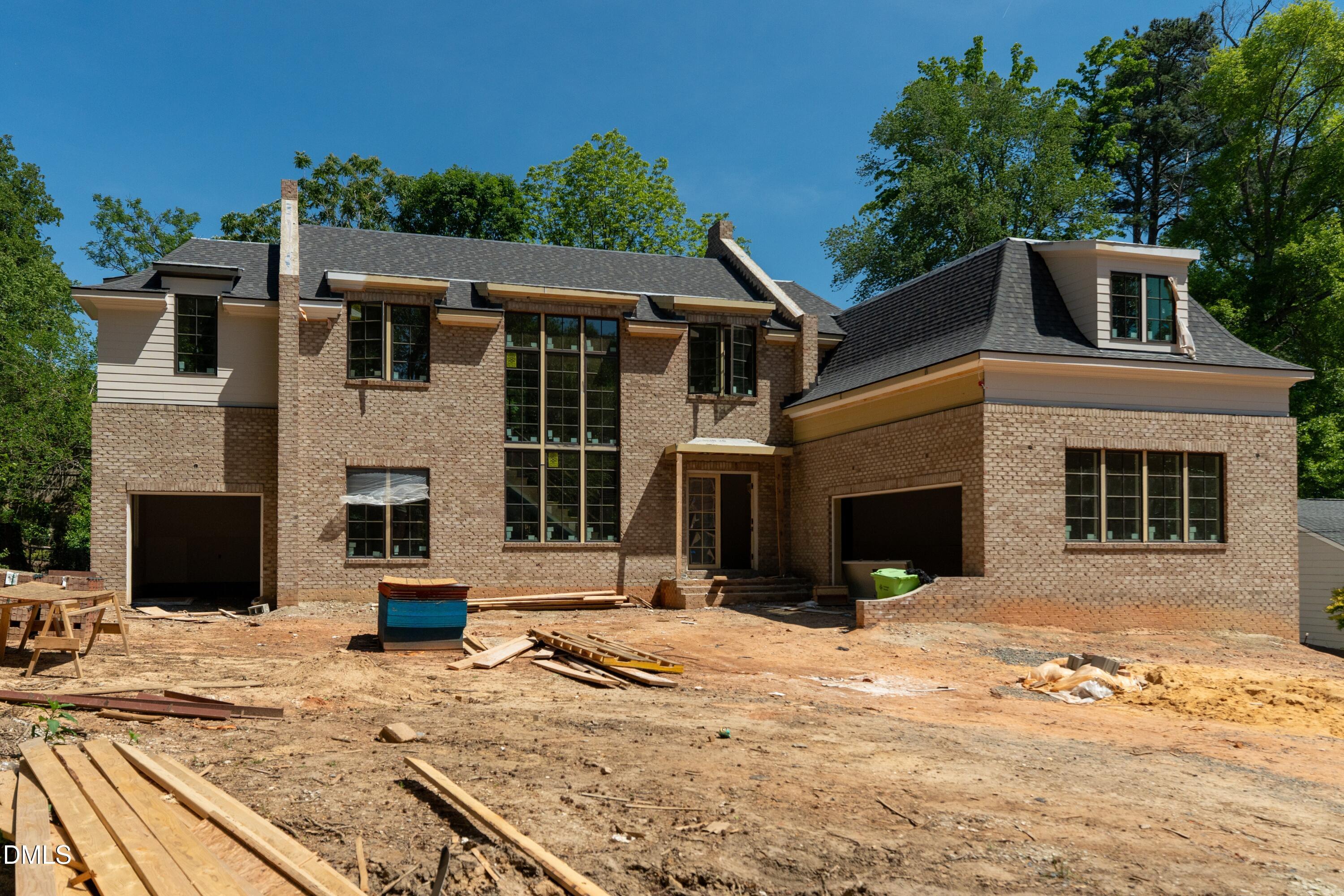 3438 Leonard Street Raleigh, NC 27607 - Photo 1 of 17 a view of a white house with a yard in front of it