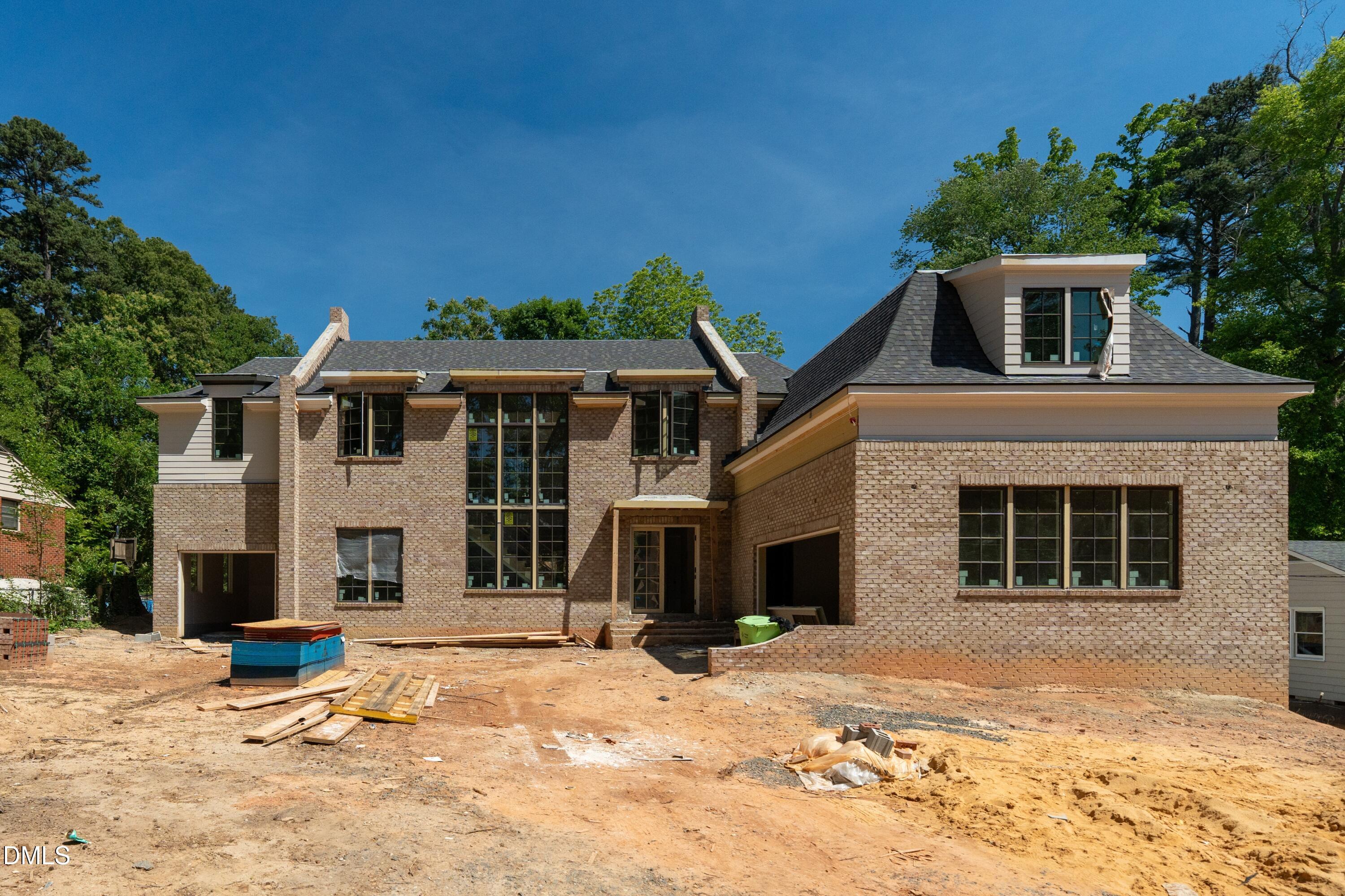 3438 Leonard Street Raleigh, NC 27607 - Photo 2 of 17 a front view of a house with a yard