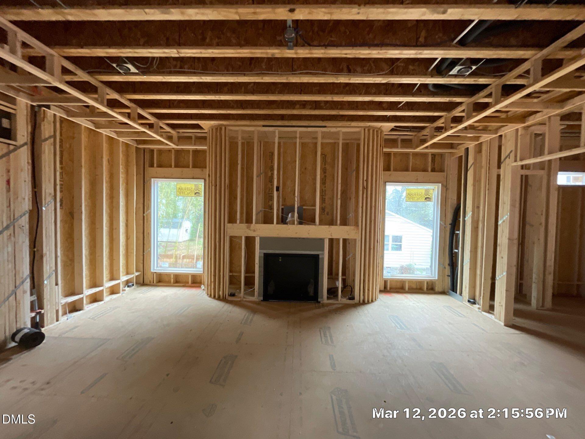 3438 Leonard Street Raleigh, NC 27607 - Photo 4 of 17 a view of an empty room with a fireplace