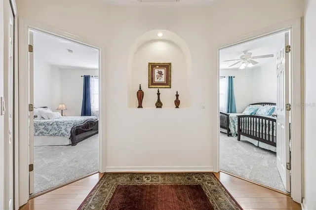 a bedroom with furniture and a window