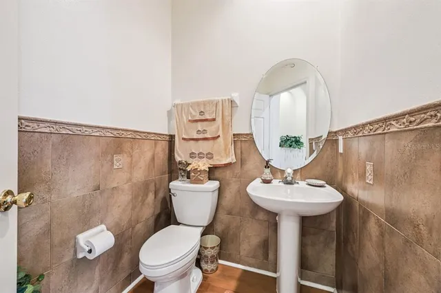 a view of a backyard with sitting area