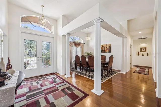 a living room with furniture and a table