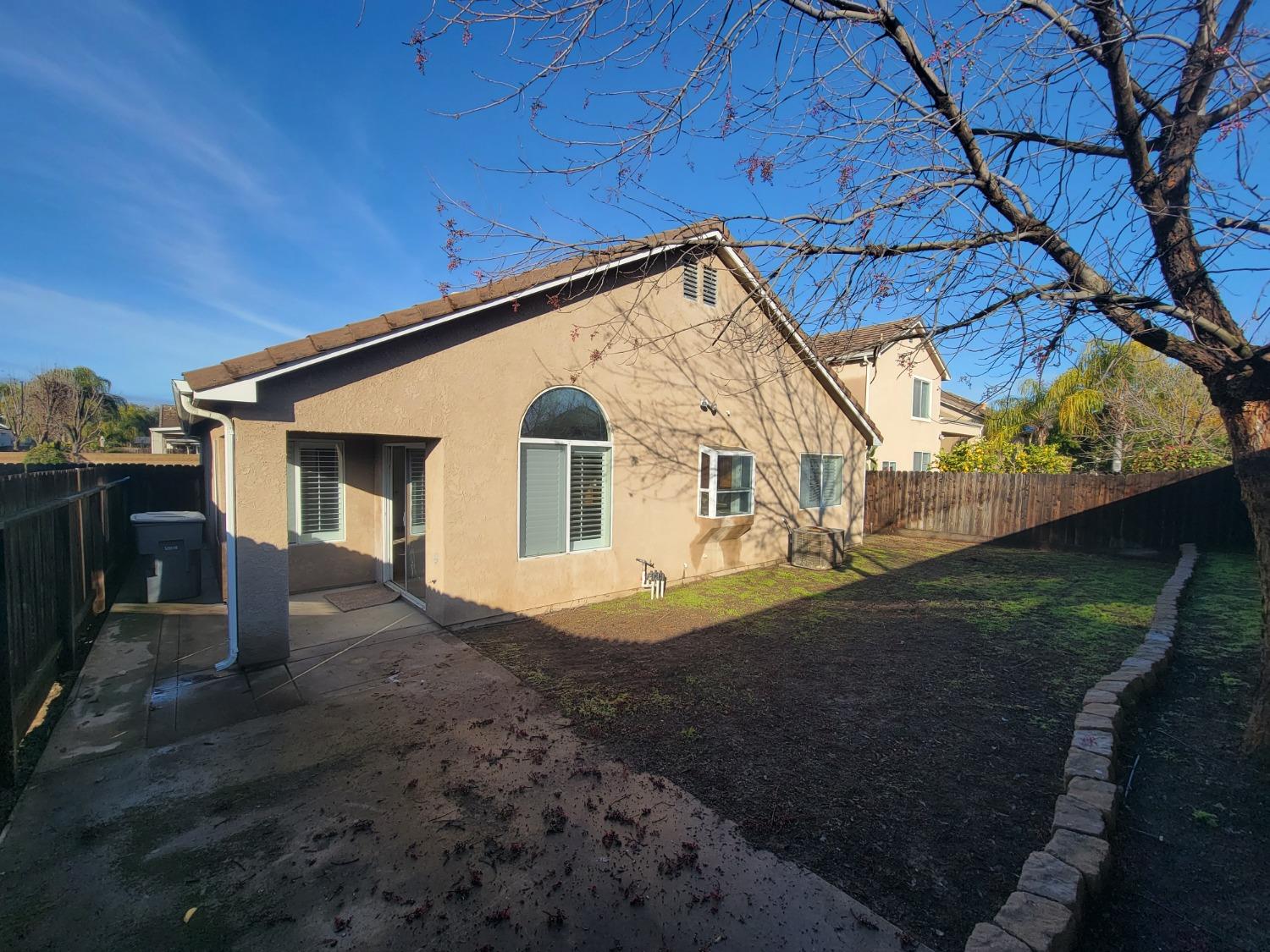 2831 Isabel Avenue Clovis, CA 93611 - Photo 26 of 27 a view of a house with a yard