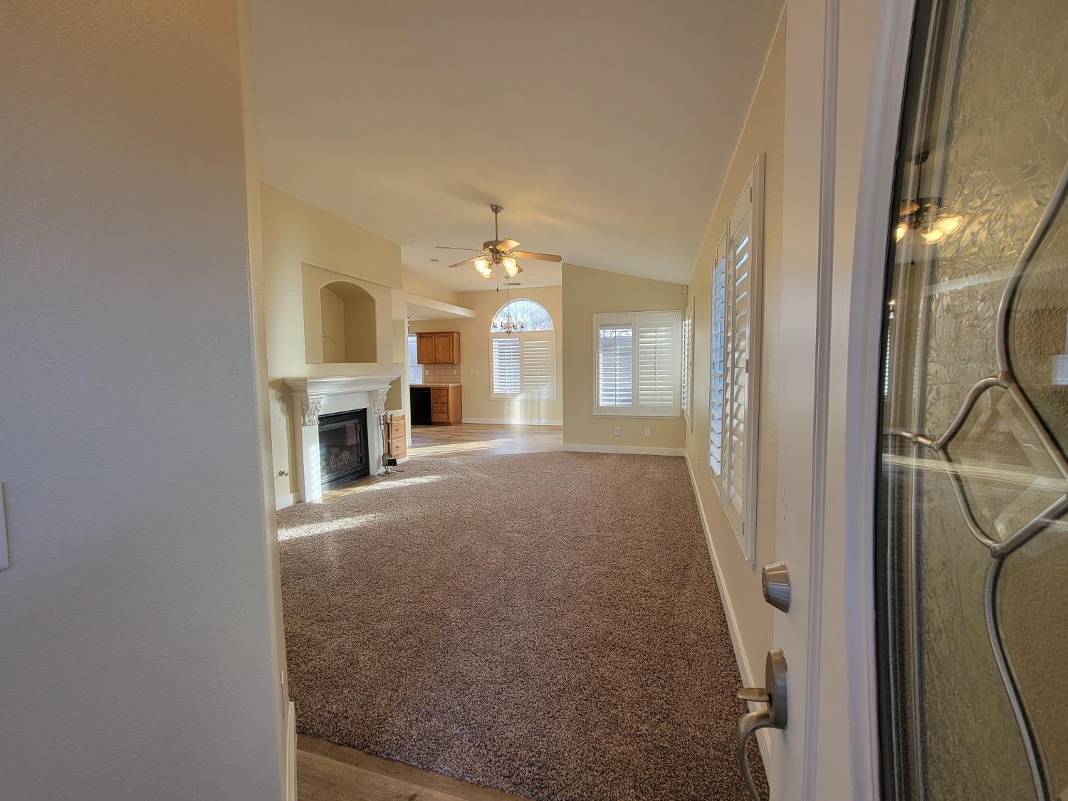 2831 Isabel Avenue Clovis, CA 93611 - Photo 3 of 27 a view of a livingroom with a fireplace