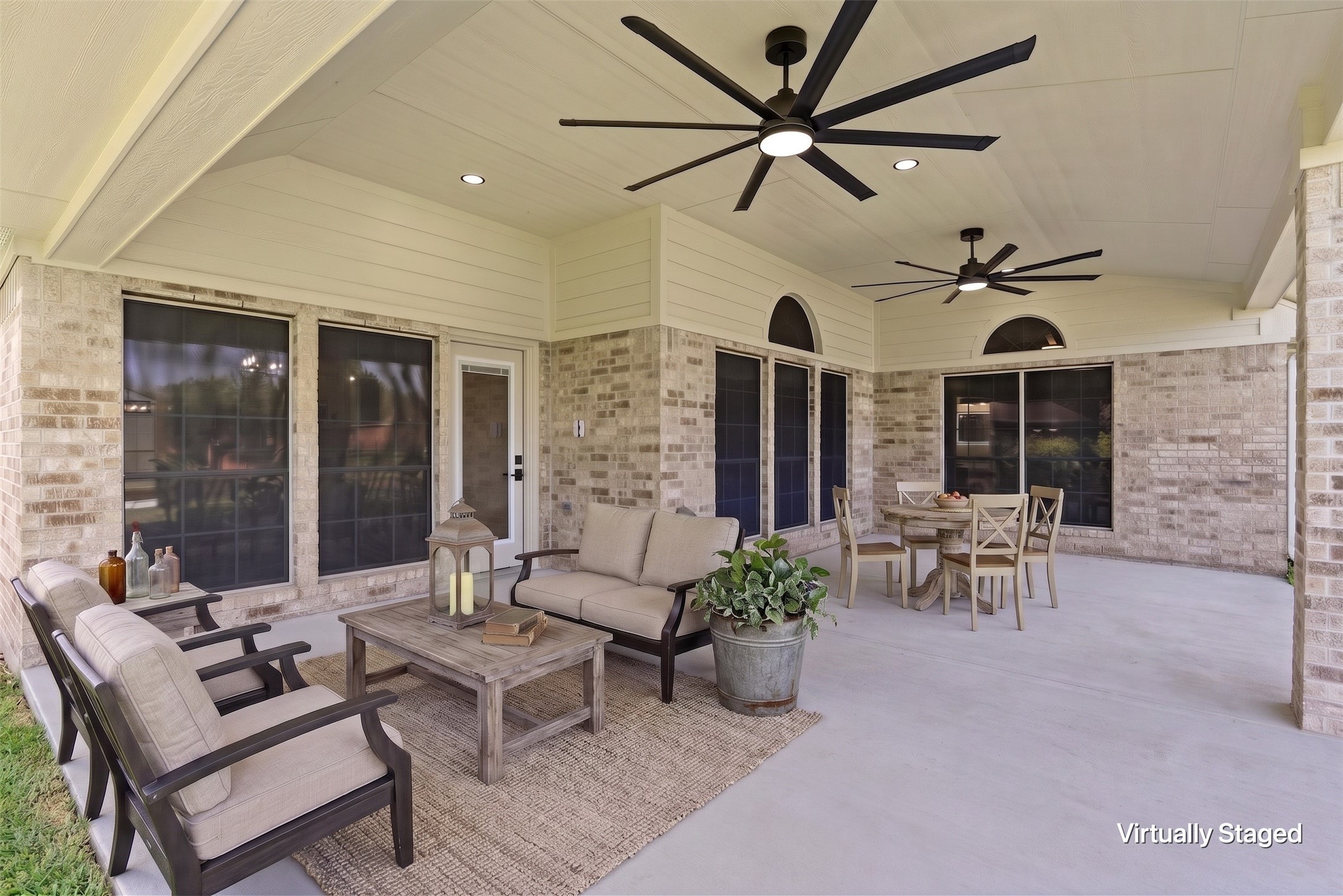 29819 South Legends Village Circle Spring, TX 77386 - Photo 37 of 48 a living room with furniture a chandelier and a large window