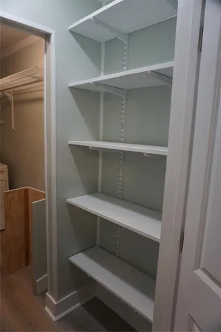 a storage room with washer and dryer