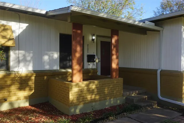 a view of a house with a patio