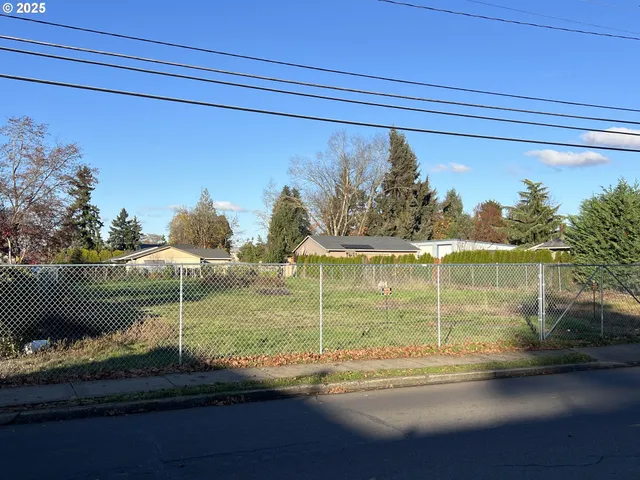 a view of a wooden fence