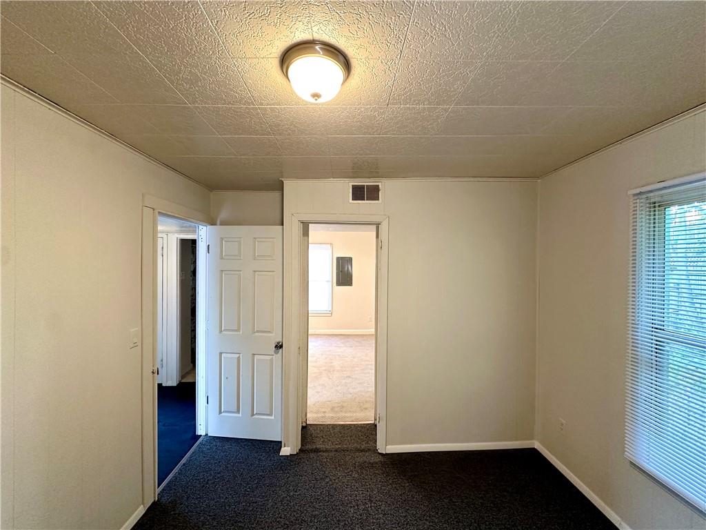 114 South Street Butler, PA 16001 - Photo 22 of 32 an empty room with wooden floor and windows