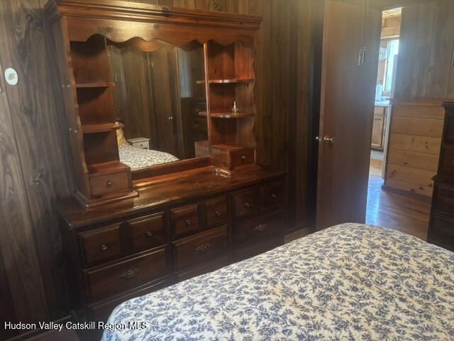 119 South Mountain Road Gilboa, NY 12076 - Photo 24 of 24 a bedroom with a bed and a mirror