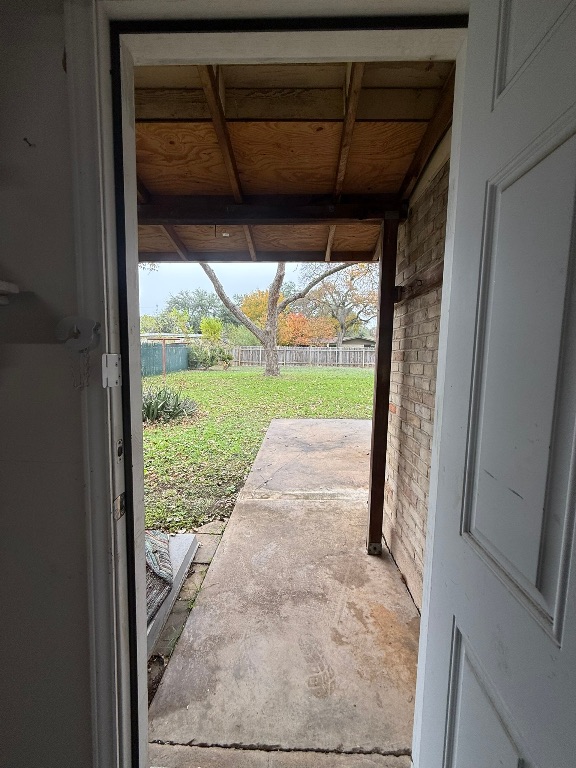4603 Roundup Trail Austin, TX 78745 - Photo 19 of 35 Doorway featuring brick wall