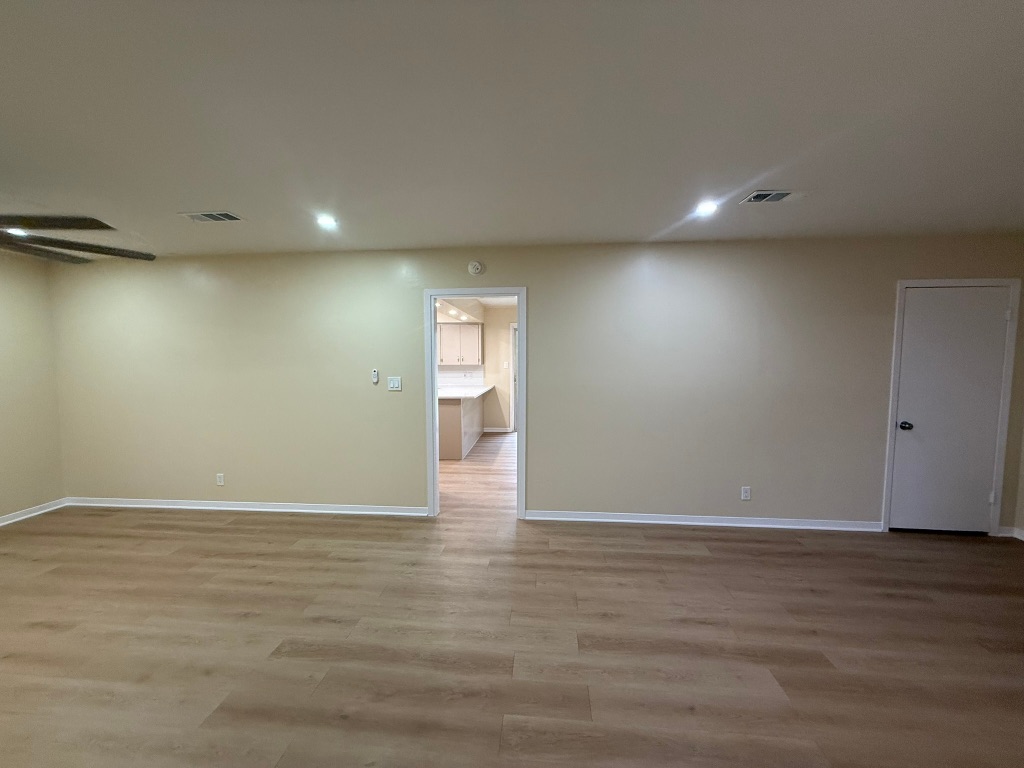 4603 Roundup Trail Austin, TX 78745 - Photo 32 of 35 featuring light wood-style floors, a ceiling fan, and recessed lighting