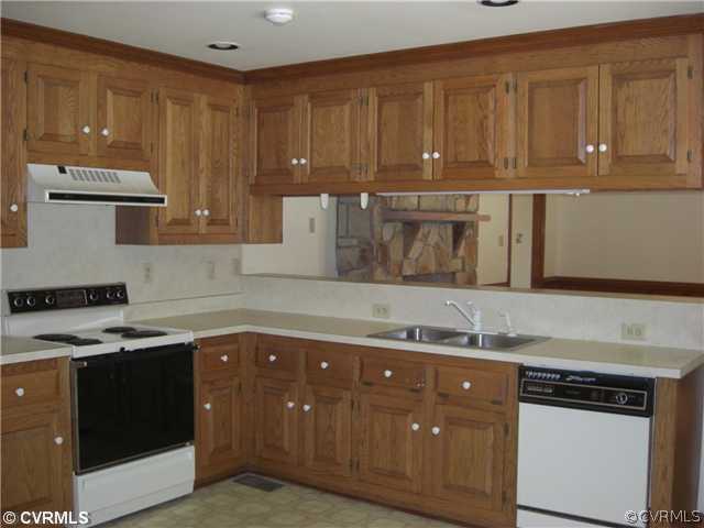 7810 Beach Road Chesterfield, VA 23832 - Photo 5 of 12 a kitchen with a sink and cabinets