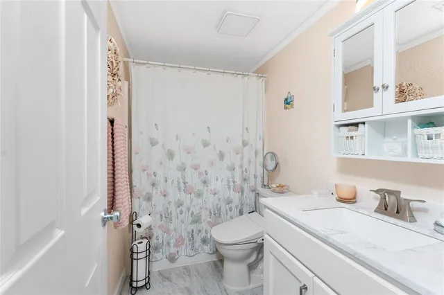 a view of a backyard with a swimming pool