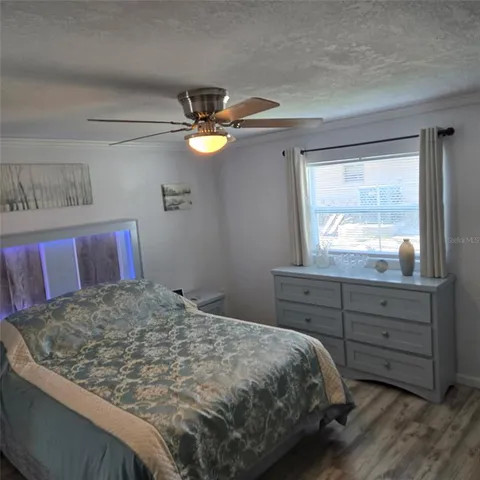 an aerial view of a house with outdoor space sitting space