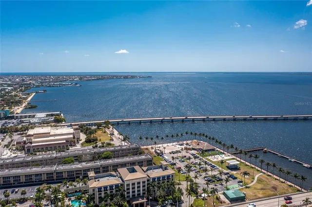 a view of a swimming pool with a yard