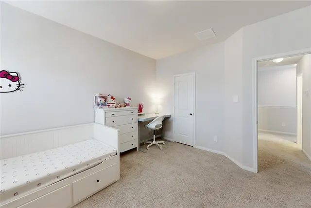 a room with a desk and chair